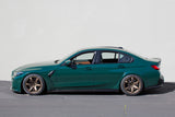 BMW M3 G80 Isle of Man Green on Rays Volk Racing TE37 Saga S-Plus Bronze Almite wheels. Exclusive Batch Spec 18x10 +8 and 18x11 +13 5x112 fitment for aggressive stance.