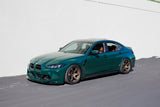 BMW M3 G80 Isle of Man Green on Rays Volk Racing TE37 Saga S-Plus Bronze Almite wheels. Exclusive Batch Spec 18x10 +8 and 18x11 +13 5x112 fitment for aggressive stance.